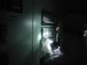 Photo 24. Checking indication valves using flashlights