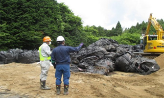 中間貯蔵施設への輸送における協力